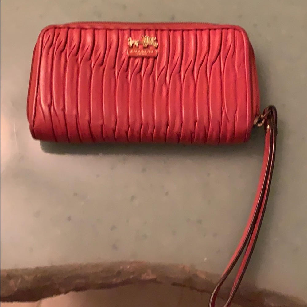 Coach wallet wristlet between deep coral & orange